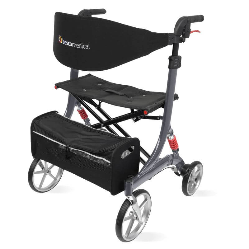 Spring XL Rollator von Bescomedical, Front-/Seitenansicht eines Rollators in der Farbe graphitgrau mit Rückengurt und Einkaufstasche