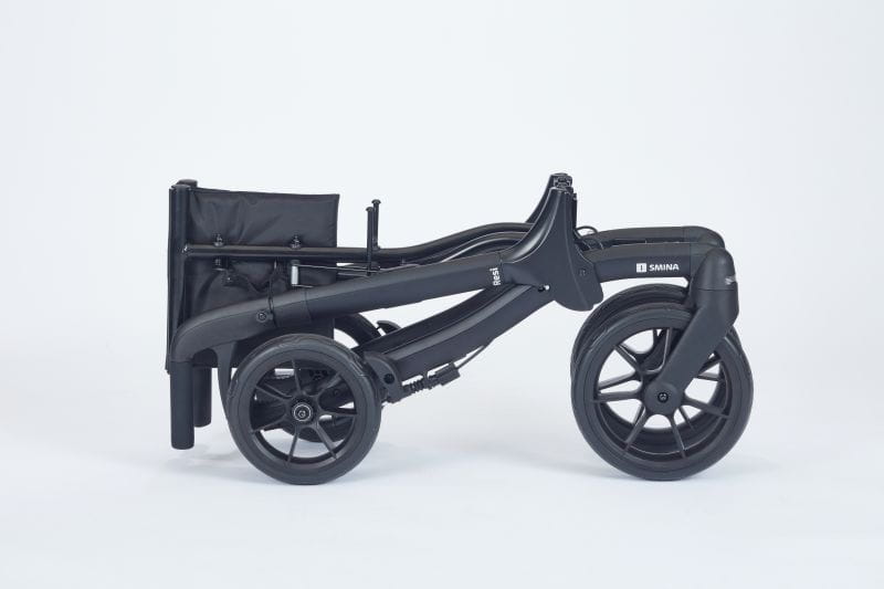 Reise-Rollator zusammengeklappt (zweifach bzw. doppelt), Modell Resi von Smina, eines carbon-schwarzen