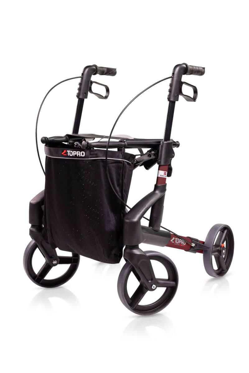 Modell Troja Black Series von Mobio, Seiten- /Frontansicht eines Rollators in der Farbe Rot mit schwarzer Einkaufstasche